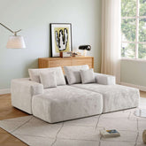 Beige L-shape corduroy sofa with ottoman, perfect for stylish and comfortable living rooms
